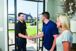trane rep greeting homeowners at the door