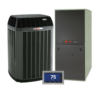 Studio shot of Trane air conditioner, furnace and digital smart thermostat